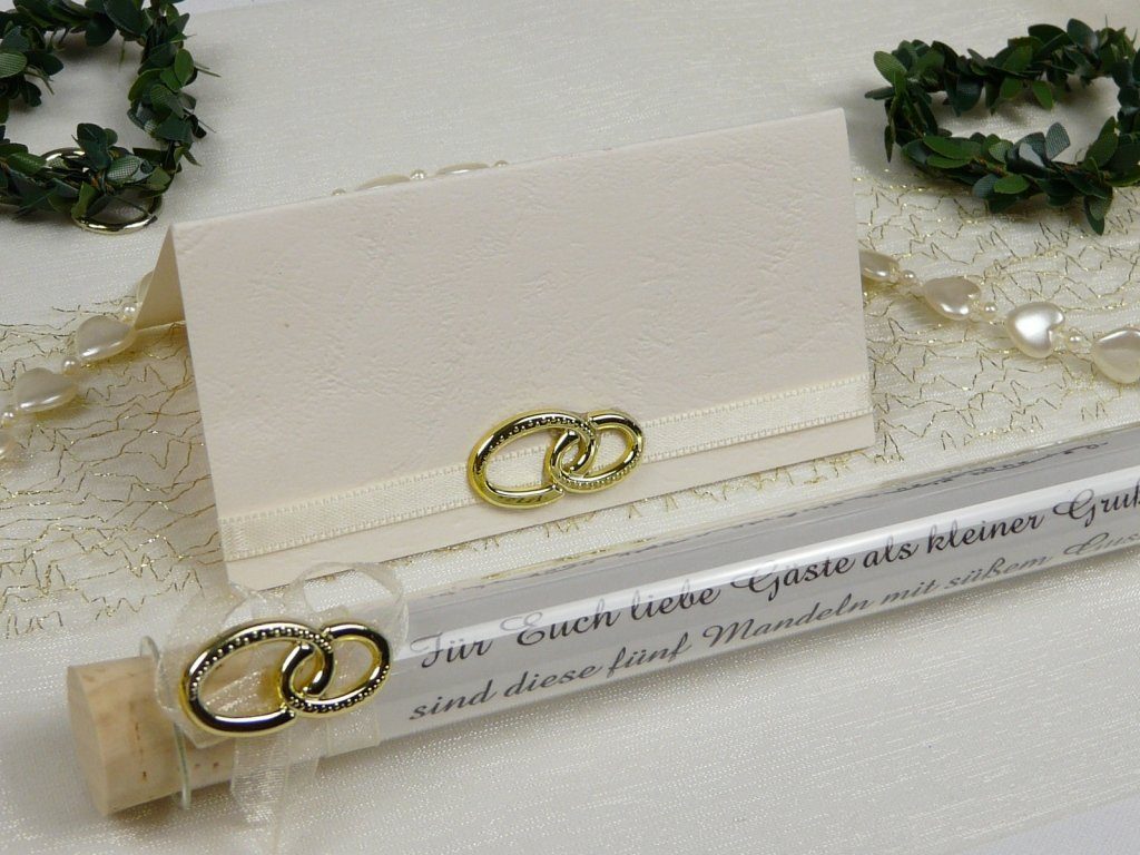 Hochzeitsdeko mit zwei Ringen in Gold oder Silber plus Hochzeitsmandeln