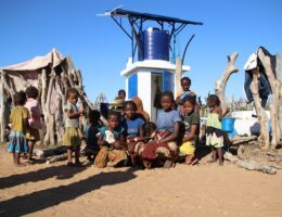 Medair - Cédric Randrianjatovonala - Children posing in front of the newly rehabilitated water point in Marojela-ee6be50d
